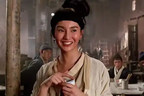 烫头红发皮衣,54岁的张曼玉率性成这样了
